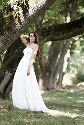 Новое свадебное платье обшитое итальянским шелком,  42-44 р-р